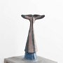 Marilu Swett, "Diver," 2014, lead, foam, wood and acrylic, 16 x 9 x 9 inches. Photo credit Stewart Clements.<br />